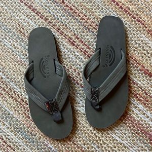 NWOT Rainbow flip flops.